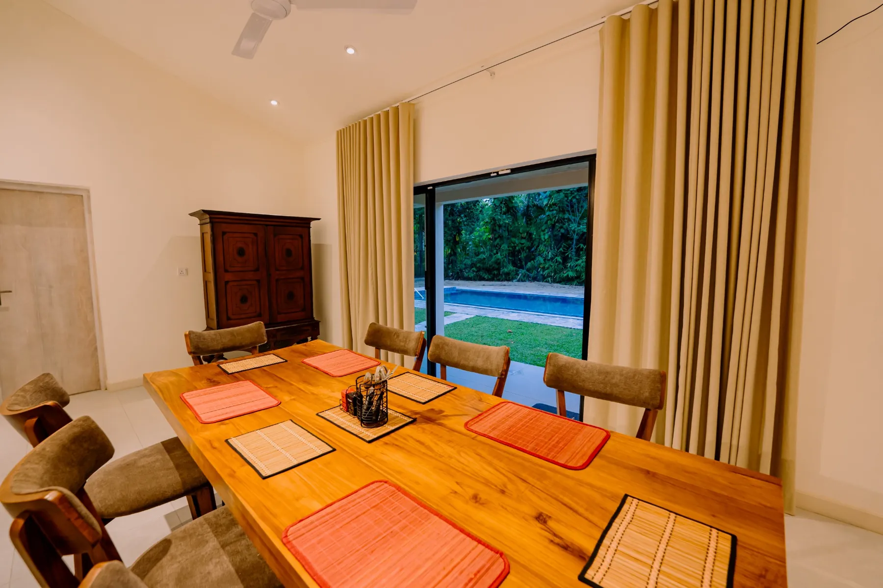 Dining room overlooking the private pool